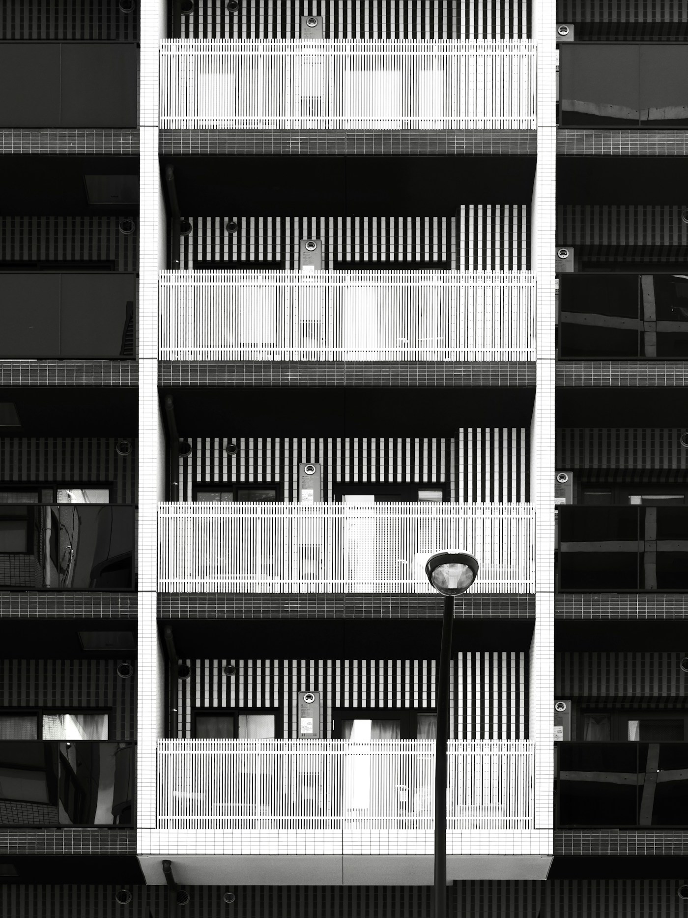 A modern residential apartment building with balconies