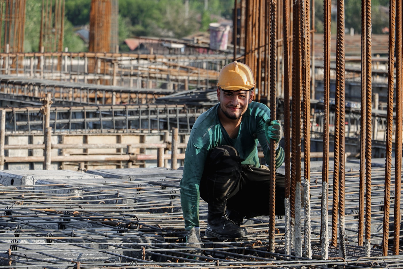 An engineer in a hard hat on a construction site